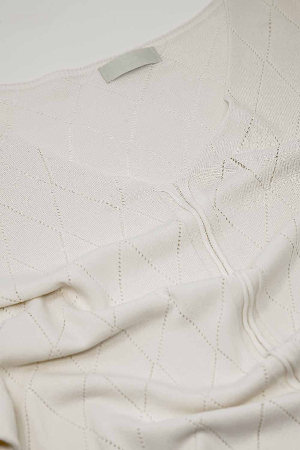 Camisola de manga curta beige com padrão Argyle
