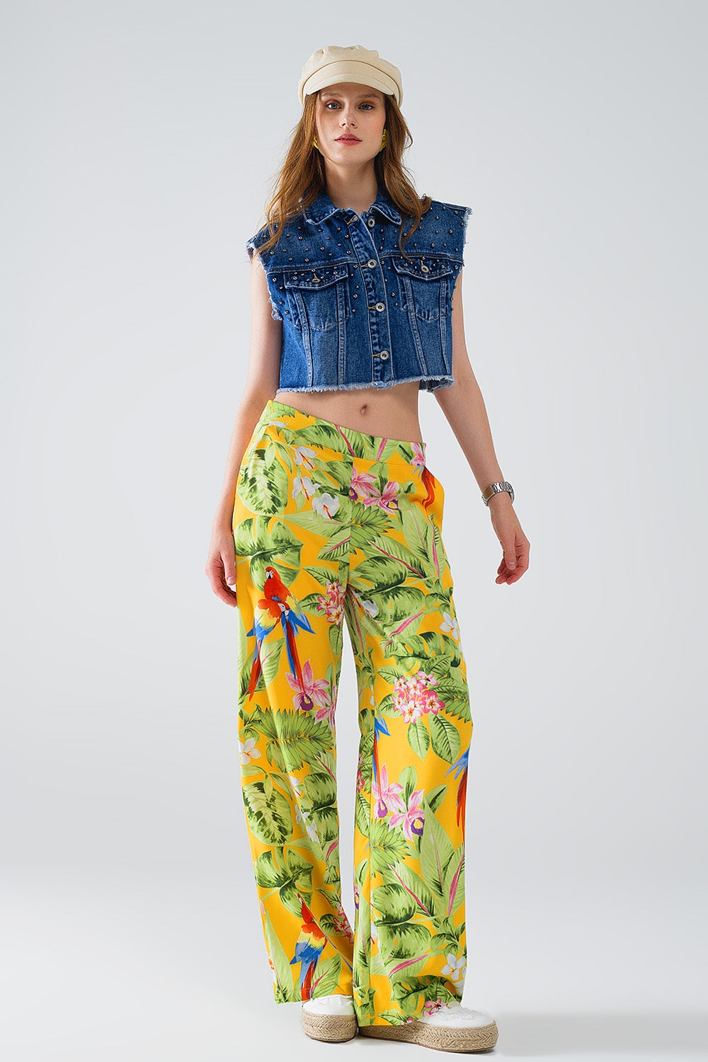 Calças amarelas com estampado tropical com fecho de correr lateral