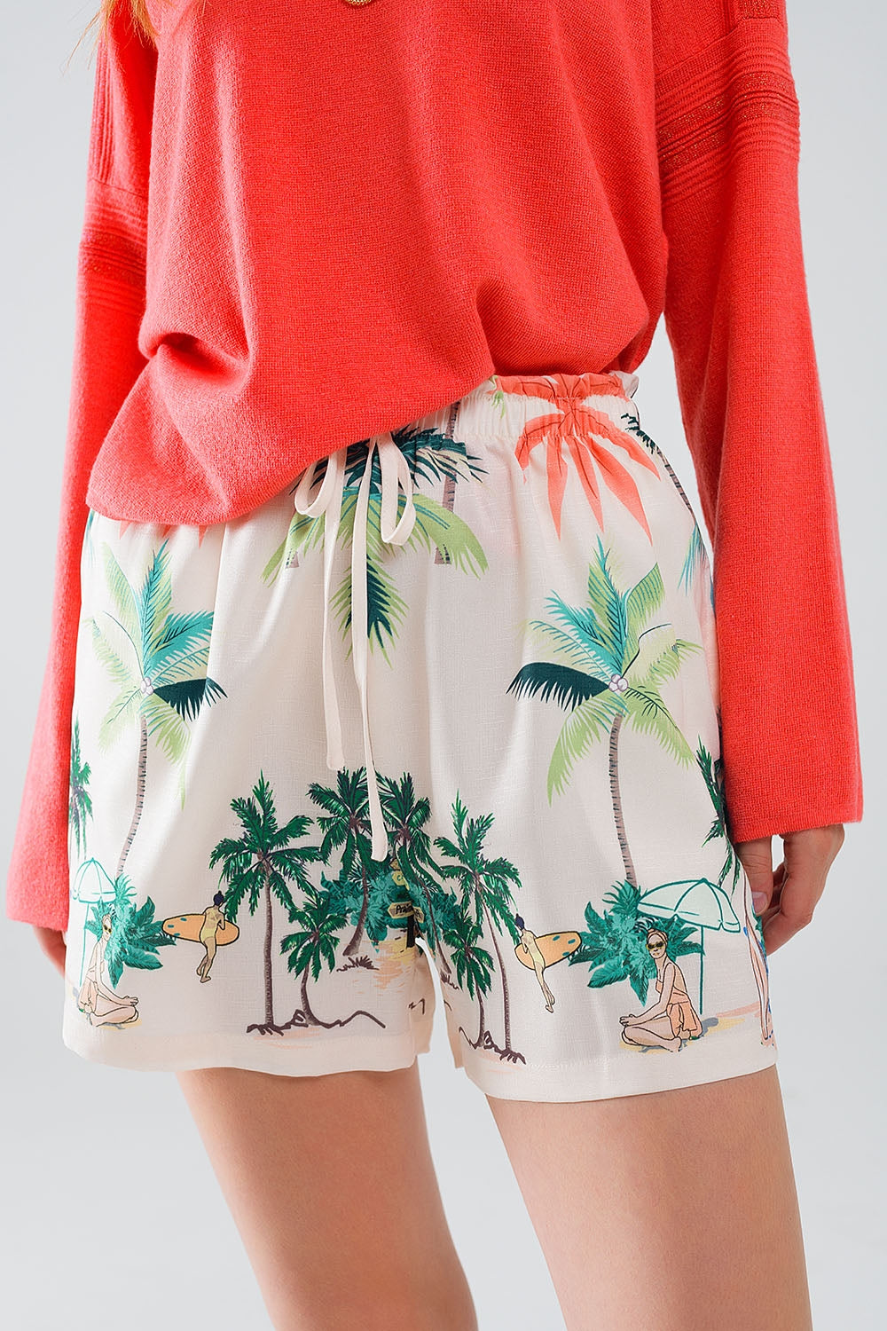 Calções creme com estampado de praia e cintura elástica