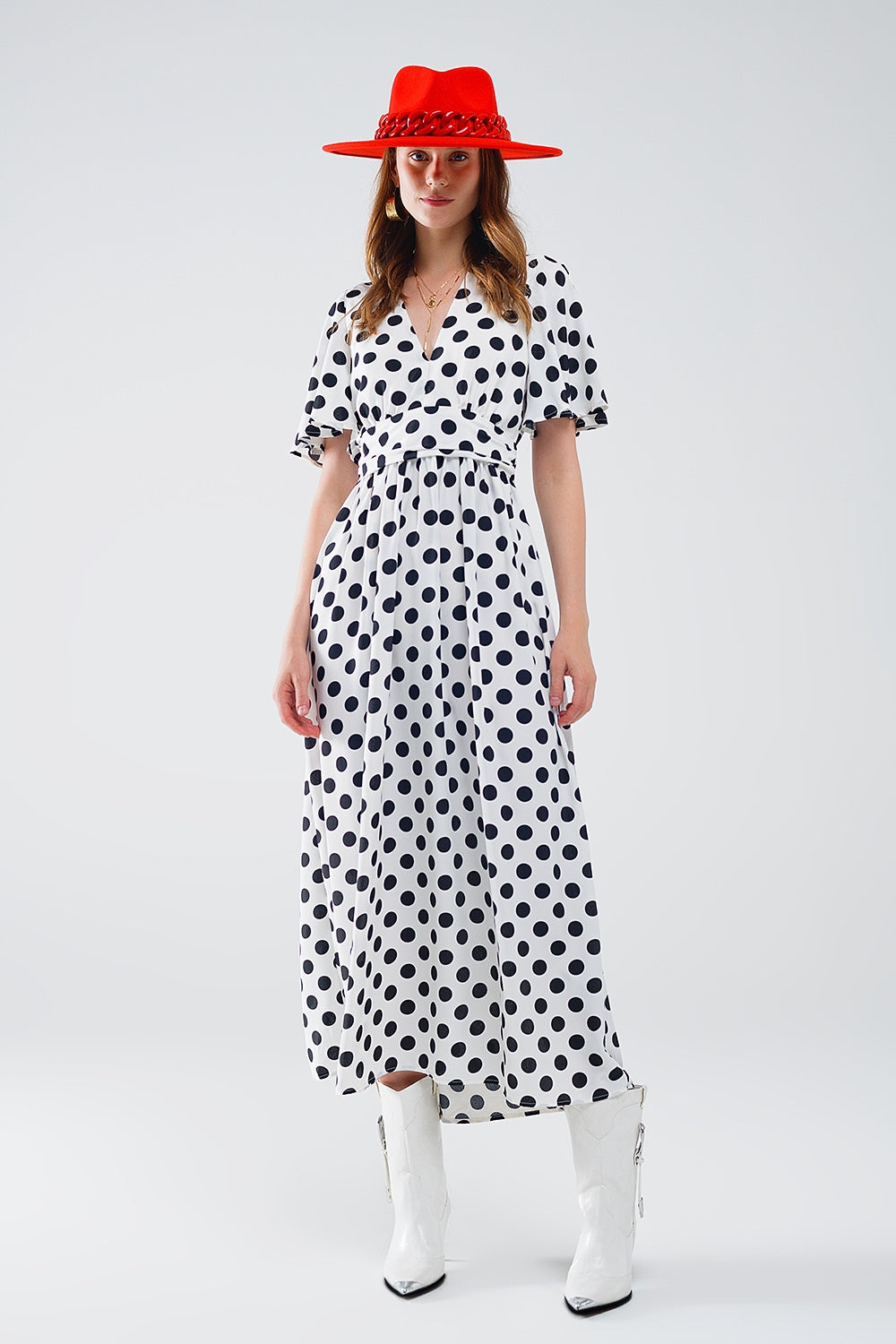Vestido maxi de bolinhas com pormenor aberto nas costas