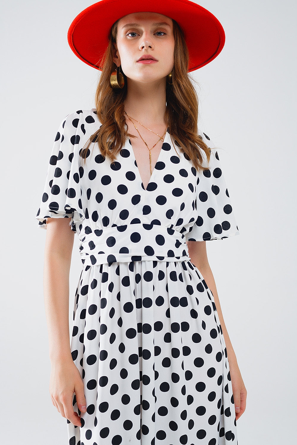 Vestido maxi de bolinhas com pormenor aberto nas costas