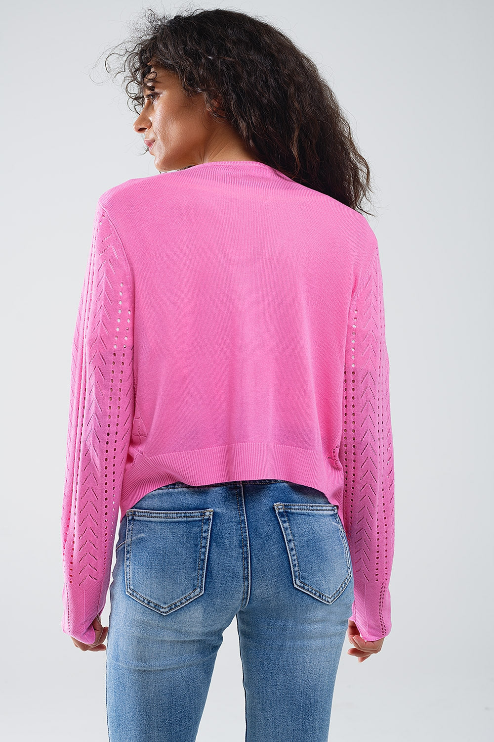 Casaco de malha cor-de-rosa com estampado Argyle e fecho com laço