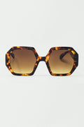 Óculos de sol hexagonais e oversized em tartaruga escura
