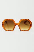 Óculos de sol hexagonais e oversized em tartaruga vintage