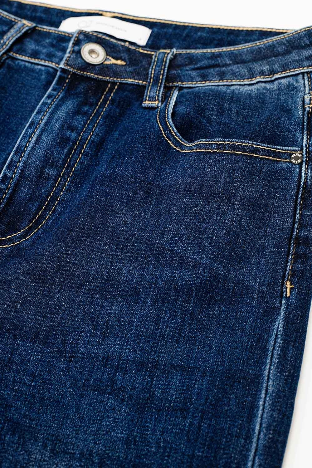 Calças de ganga direitas de ganga azul-escuro com bainha dobrada