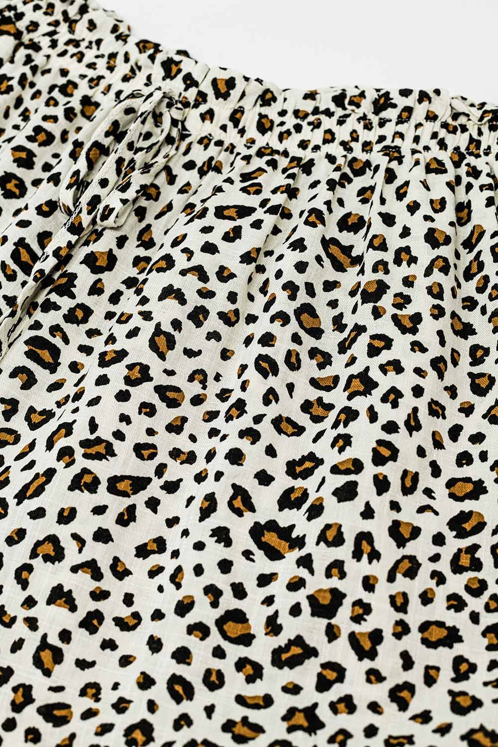 Calças de cintura elástica de perna direita com estampado leopardo