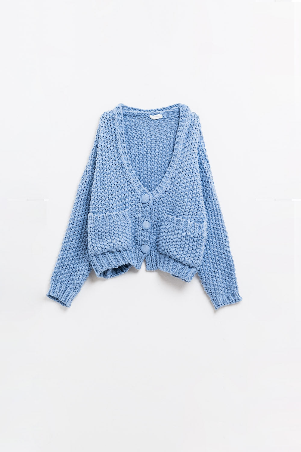 Casaco de malha volumoso azul-claro de grandes dimensões com bolsos