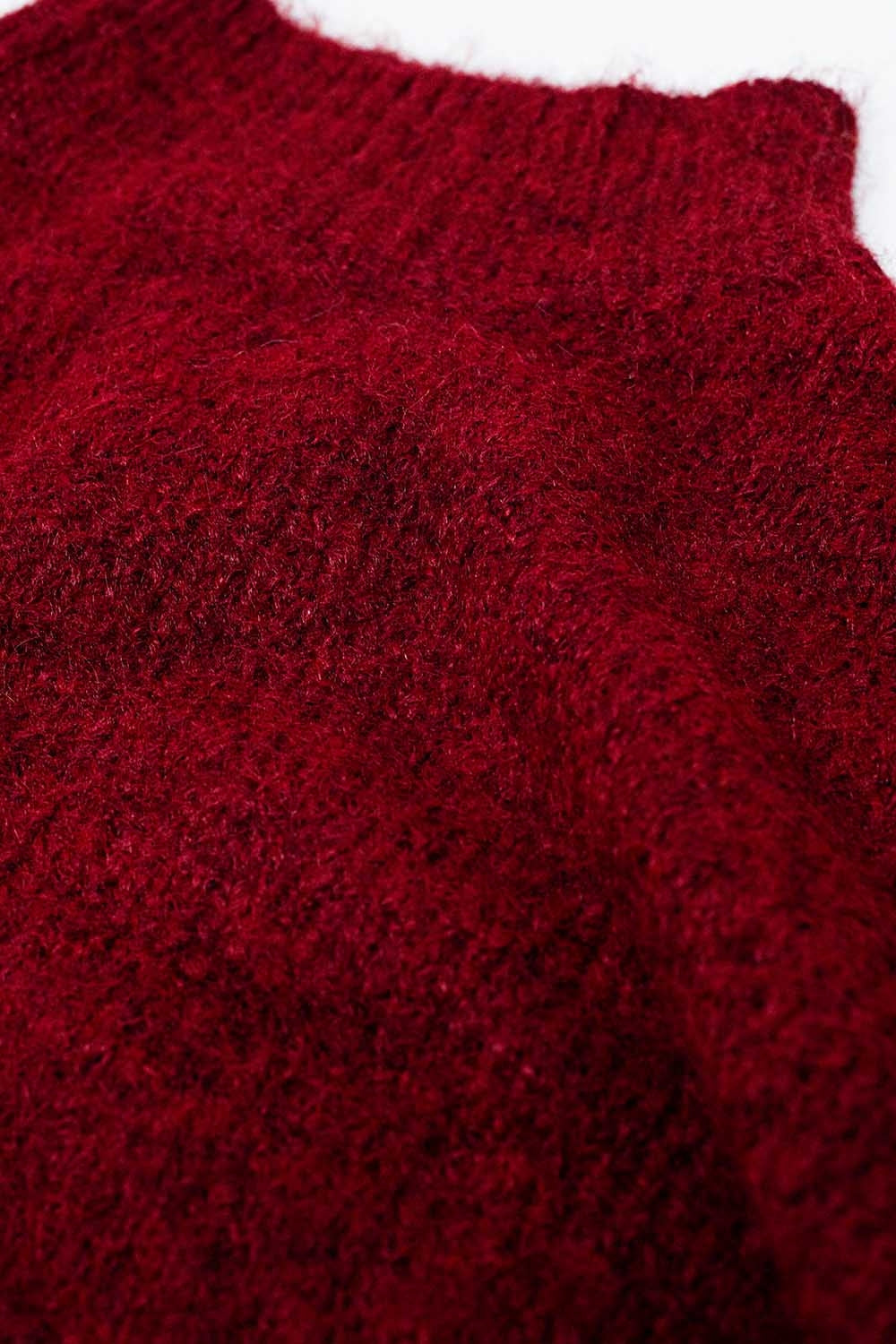 Camisola vermelha felpuda com gola alta e mangas em balão